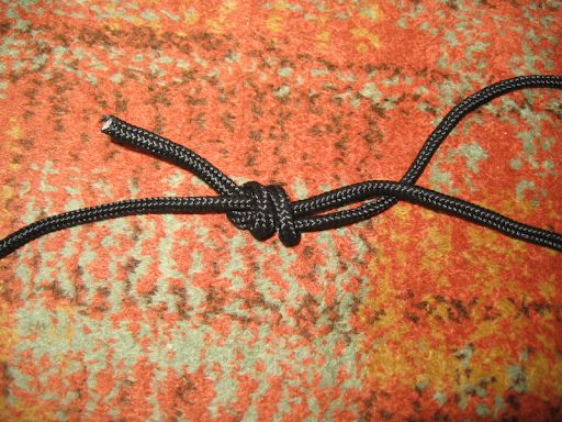 Fisherman's knot step 3