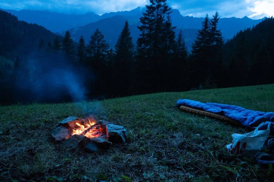 Sleeping by the campfire with a nice mountain view