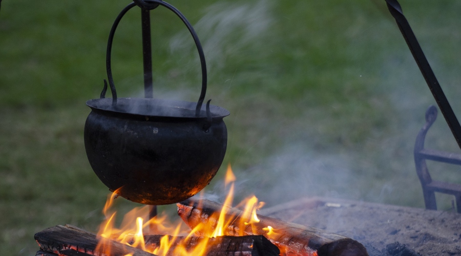 Cooking in a cauldron above the fire