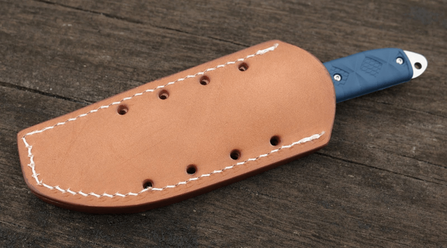 The KA-BAR Boss knife in a leather sheath